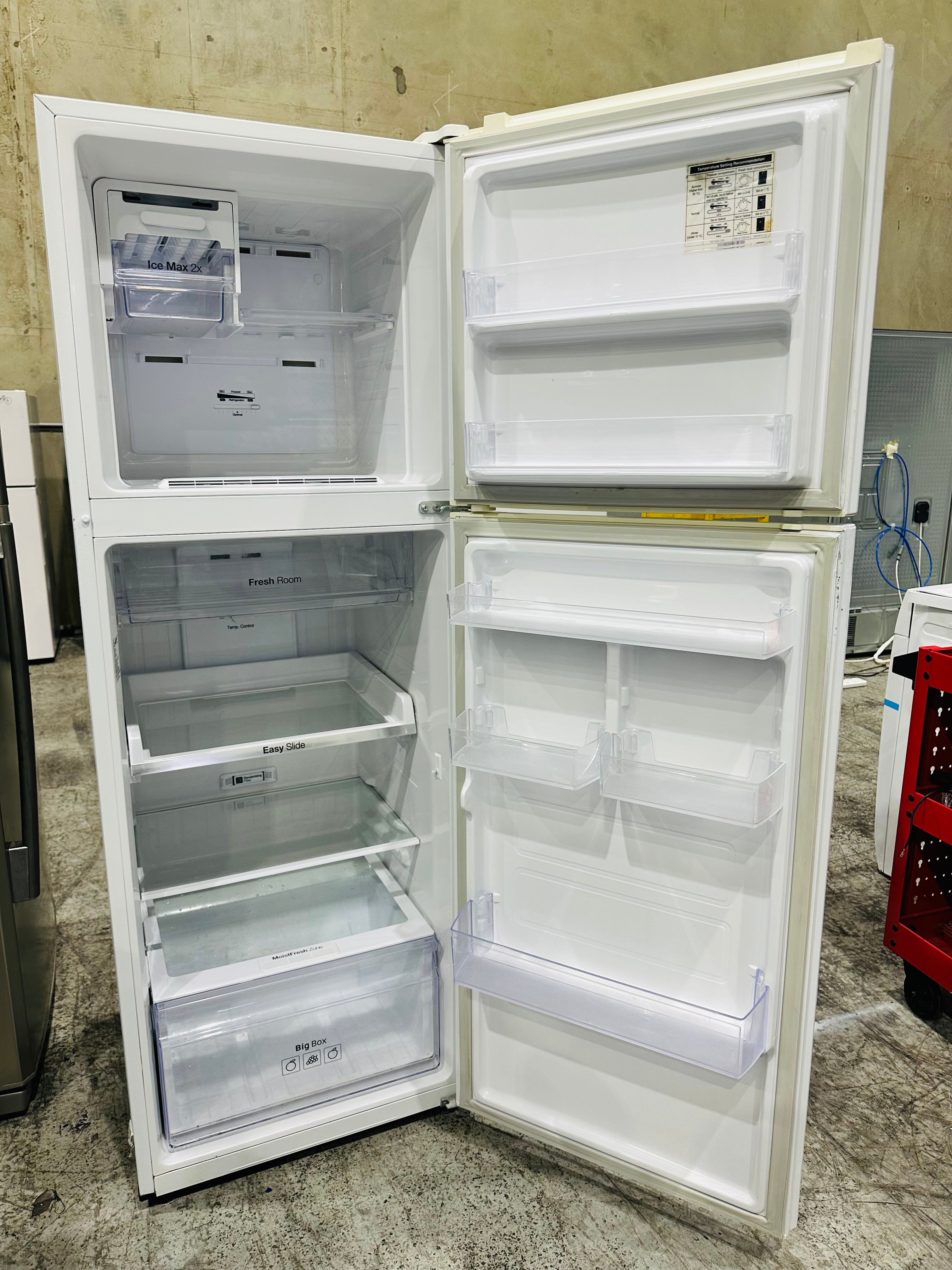 Samsung 341L Fridge Freezer & Fisher & Paykel 8.5kg Top Loader Combo
