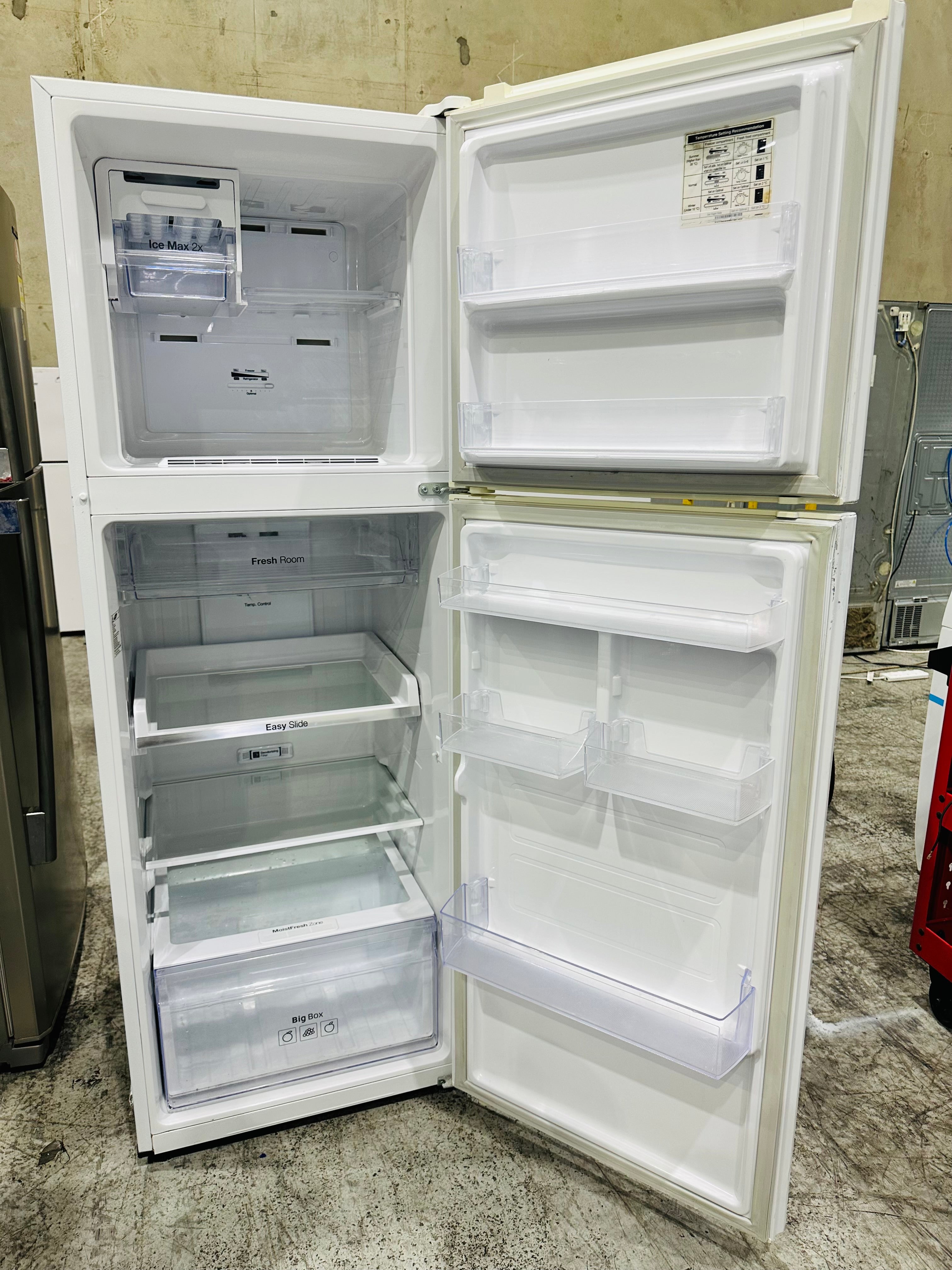 Samsung 341L Fridge Freezer & Fisher & Paykel 8.5kg Top Loader Combo