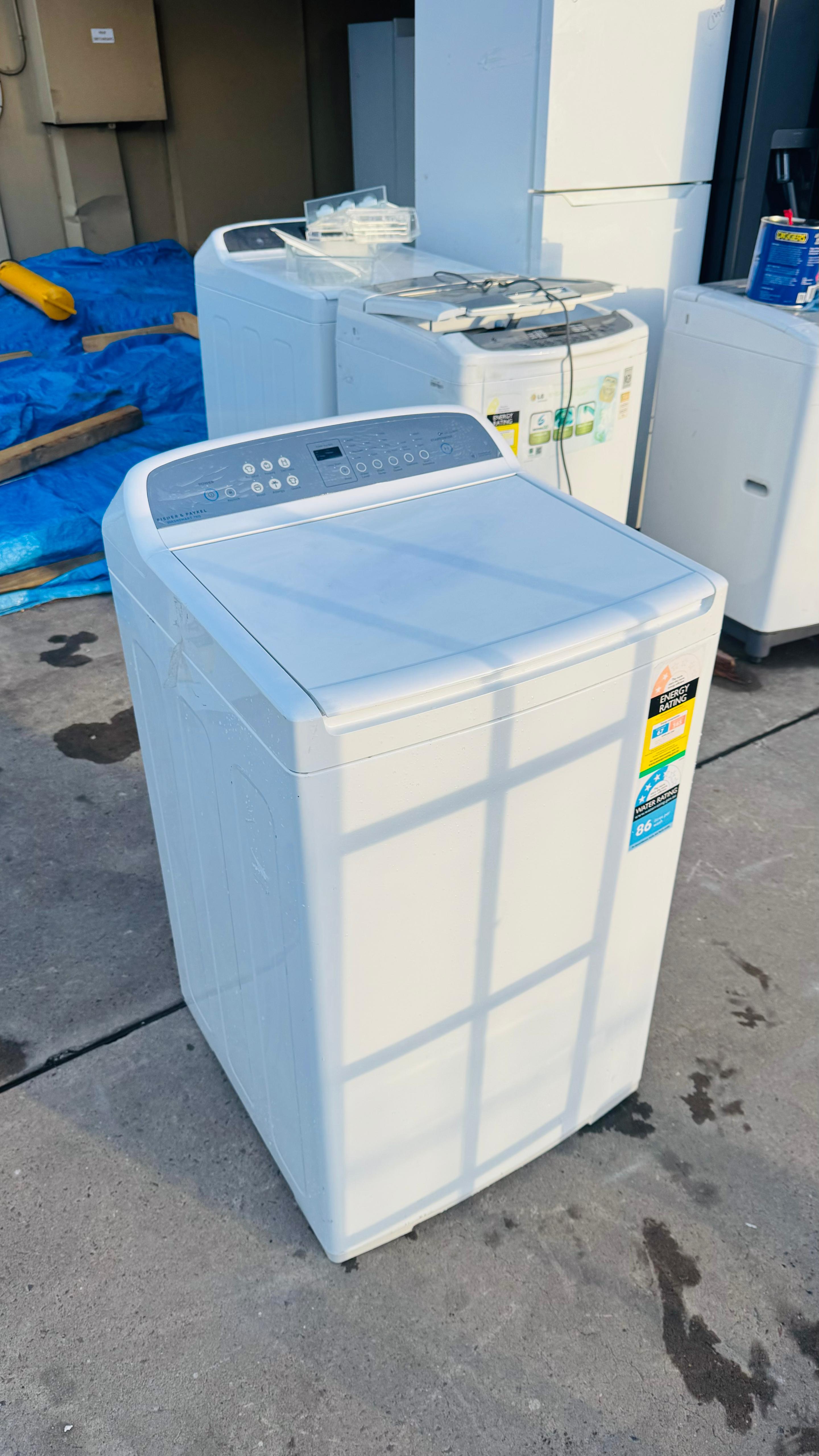FISHER AND PAYKEL 7KGS TOP LOADER WASHING MACHINE