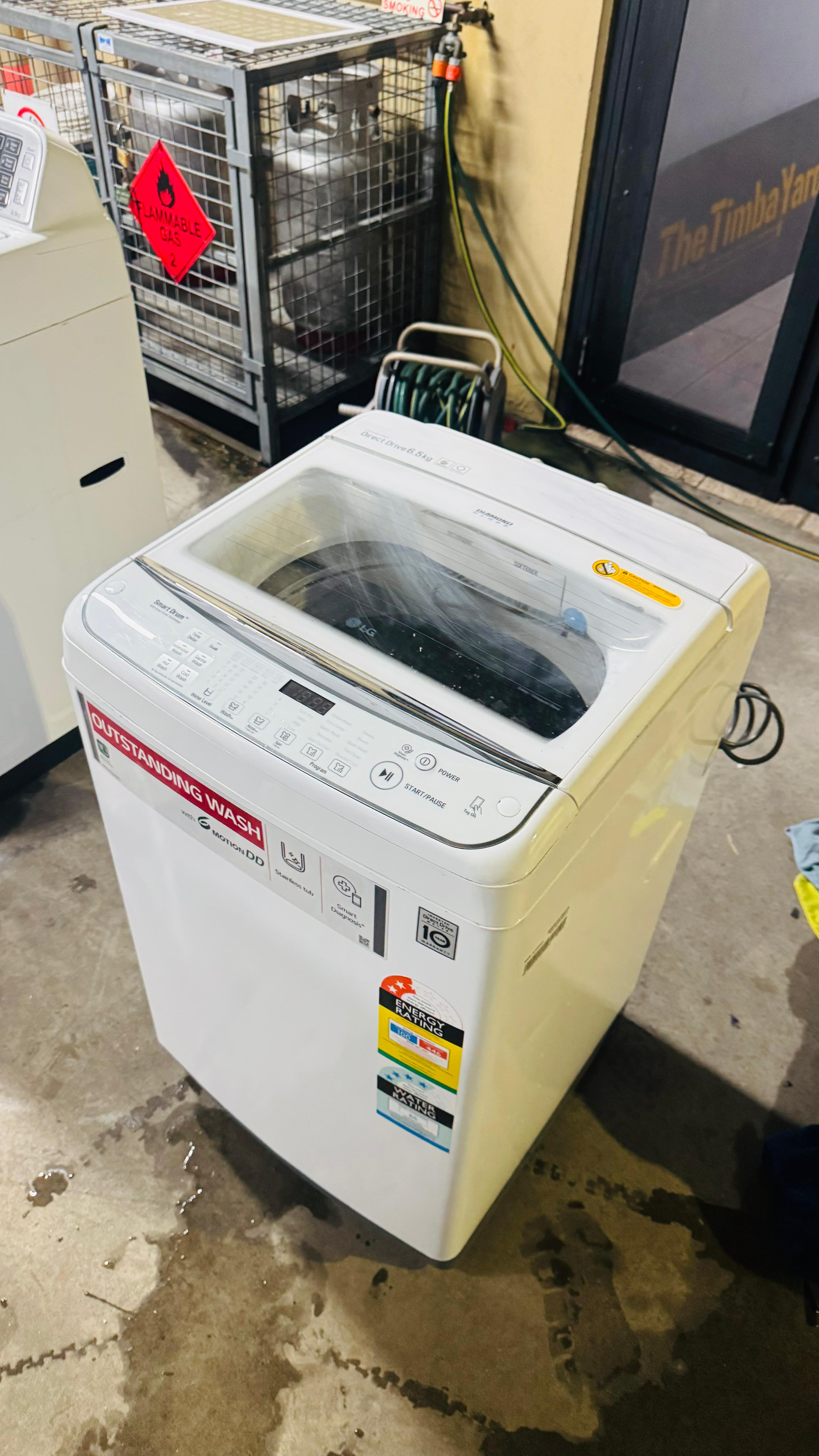 LG 6.5 KGS TOP LOADER WASHING MACHINE