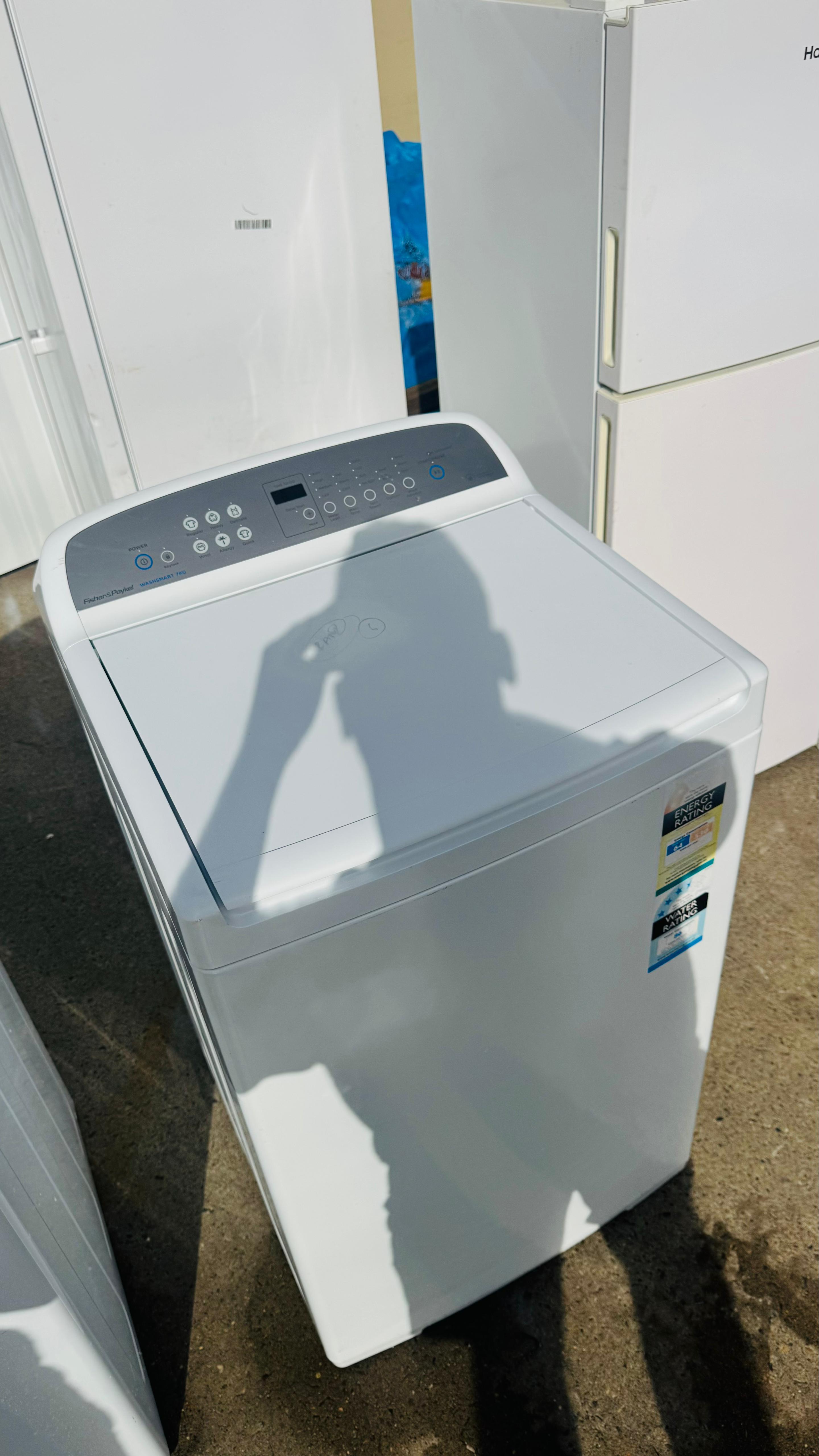 FISHER AND PAYKEL 7KGS TOP LOADER WASHING MACHINE