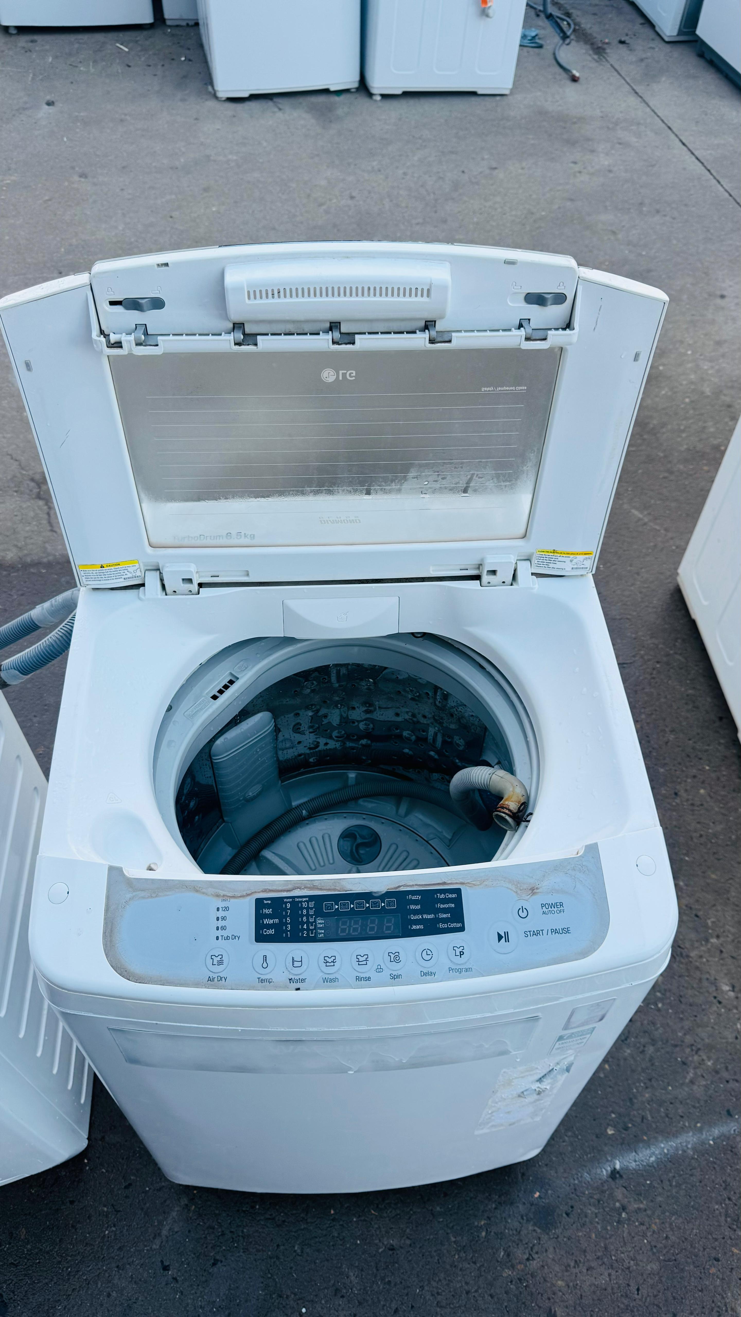 LG 6.5 KGS TOP LOADER WASHING MACHINE